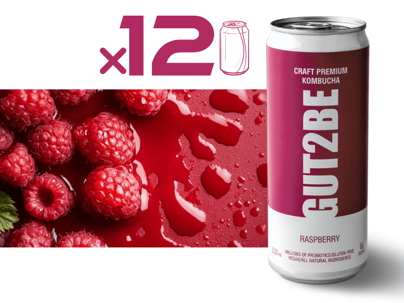 Málnás ízesítésű probiotikus kombucha friss málnával díszítve